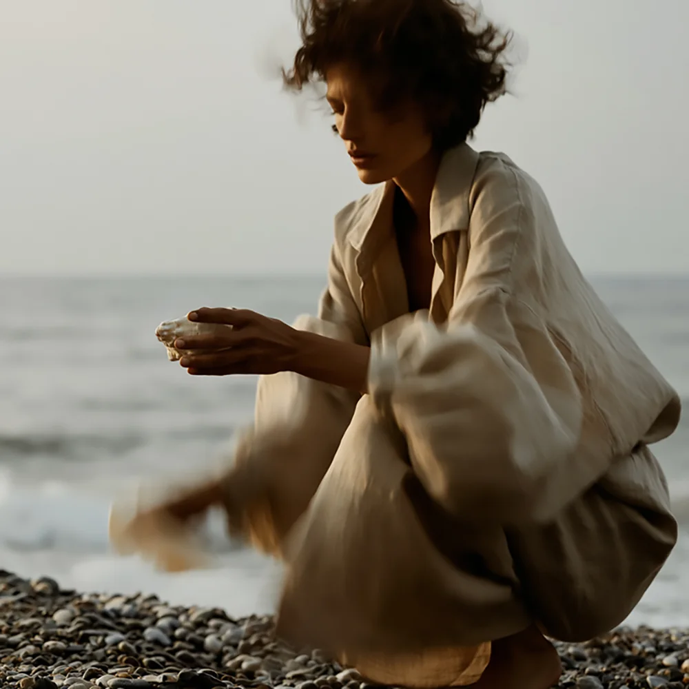 Quiet Luxury Stock Images montage woman by sea