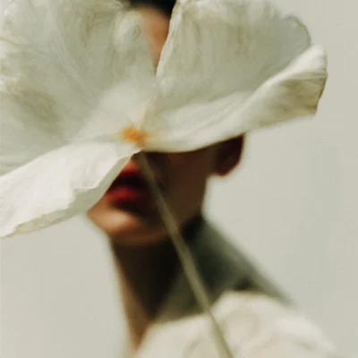 quiet luxury stock images woman with flower