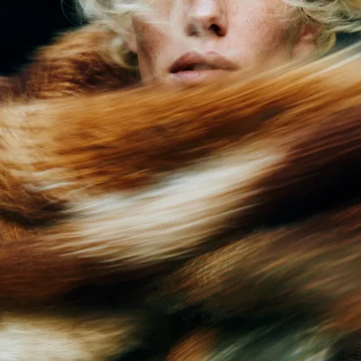 AUTUMN EDIT stock collection crop shot of woman wearing a scarf