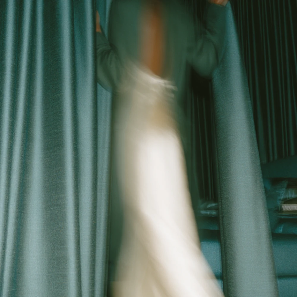 Color Blue Volume 1 title over a motion-blurred figure framed by deep teal curtains.