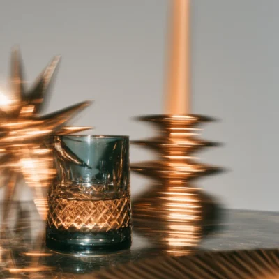 Cinematic festive editorial scene with warm Christmas lighting and seasonal styling.