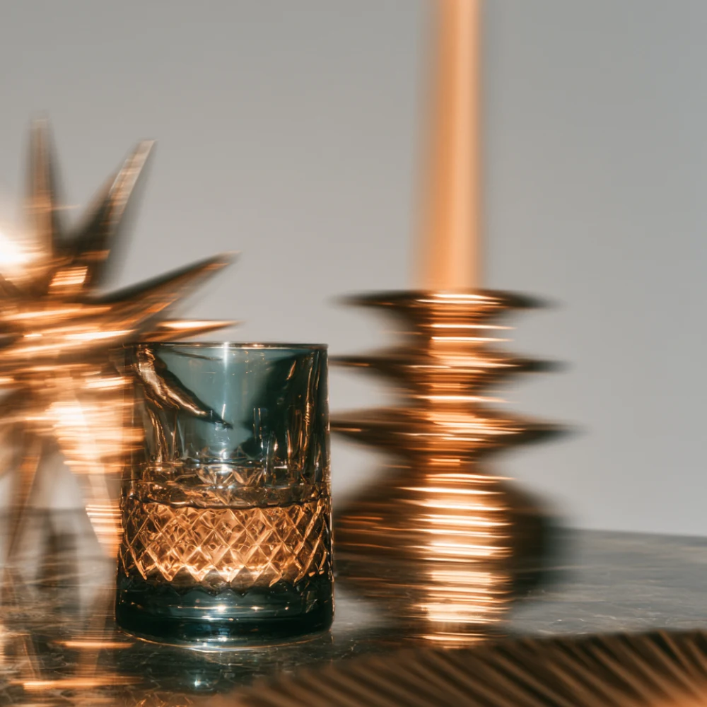 Cinematic festive editorial scene with warm Christmas lighting and seasonal styling.